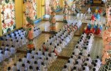 The Holy See of the Cao Dai is in the Vietnamese province of Tay Ninh, close to the Cambodian frontier, and this syncretic religion – which counts Victor Hugo, Laozi and Jesus among its saints – has also made some Khmer converts.<br/><br/>Vietnam has two indigenous religious sects, both of which were established in the 20th century, and both of which are based firmly in the south of the country. Cao Dai or ‘Supreme Altar’ is a syncretic faith combining aspects of the tam giao with Catholicism and is the larger of the two, with an estimated 2 million followers. Cao Dai is an eclectic amalgam of Confucianism, Taoism, Buddhism and Catholicism. The second sect, called Hoa Hao or ‘Peace and Happiness’, is centred on Chau Doc in the Mekong Delta. Its followers practise an ascetic and austere form of Buddhism.<br/><br/>The Cao Dai religion was founded in 1919 by a Vietnamese civil servant, Ngo Van Chieu and by the mid-1920s Tay Ninh had developed as the ‘Holy See’ of the new religion, with a hierarchy organised under a Cao Dai pope. Initially persecuted by the communists, Cao Dai is now tolerated, and has an estimated two million followers, mainly in the south.